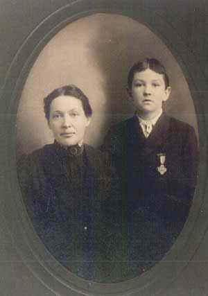 Mary Sawyer and her son Henry Washington Sawyer, 2nd wearing his father’s Civil War medal. This photo was taken approximately nine years after the death of Henry Sawyer, Sr.
