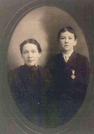 MrsHSawyerW Mary Sawyer and her son Henry Washington Sawyer, 2nd wearing his father’s Civil War medal. This photo was taken approximately nine years after the death of Henry Sawyer, Sr.