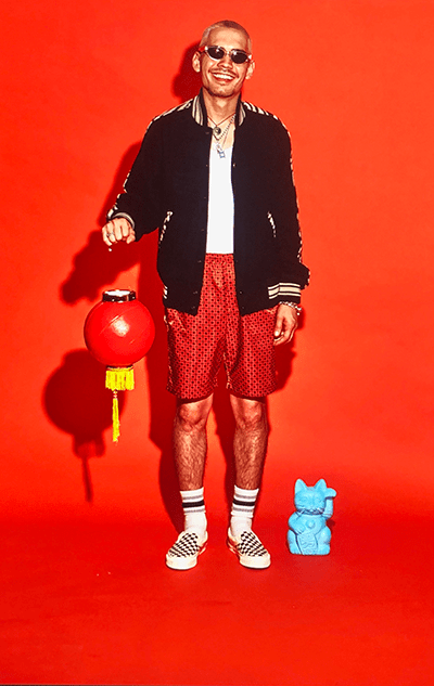 Alexander Charles on a red background