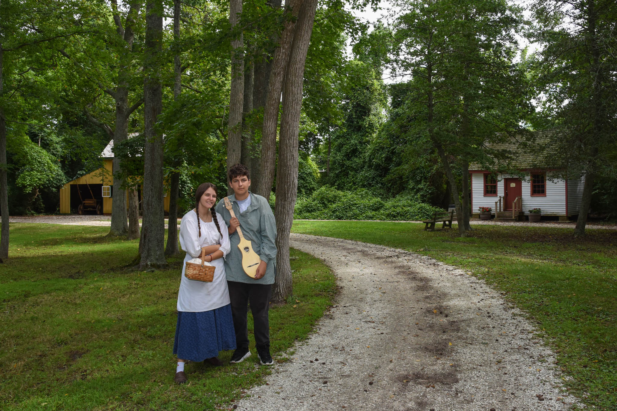 Two kids donating their time to explain this rich history at Historic Cold Spring Village.