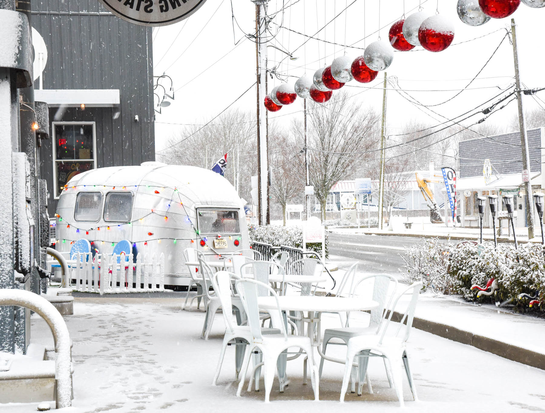 Exit Zero Filling Station all covered in snow.