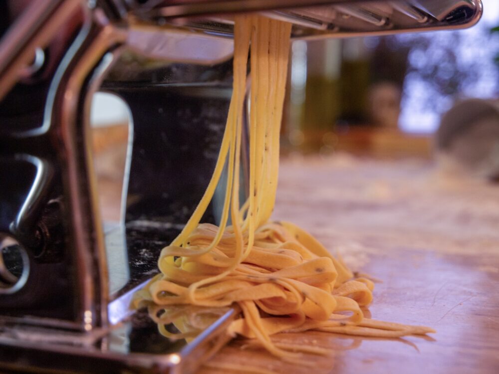 Fresh pasta in a pasta machine
