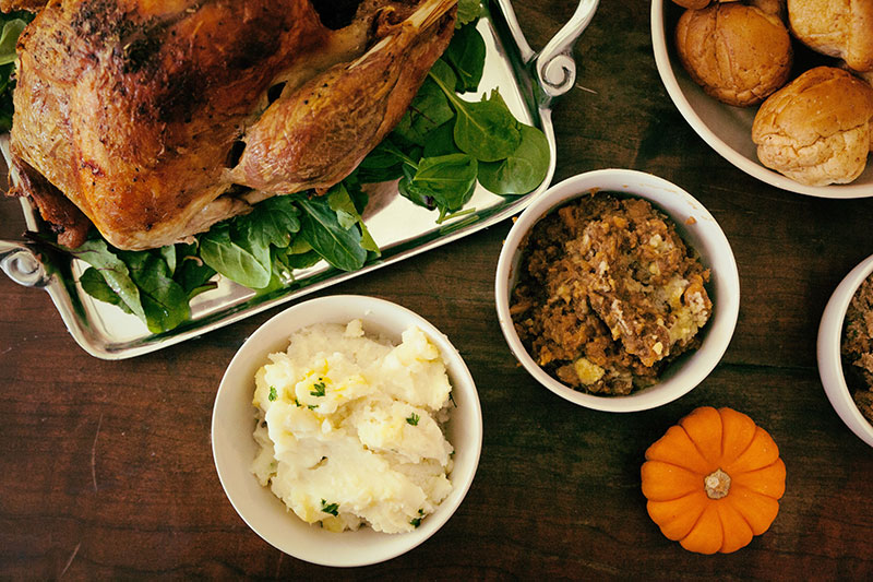 Flat view of Turkey and Thanksgiving side dishes