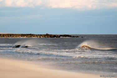 40 MPH winds curl back the surf.