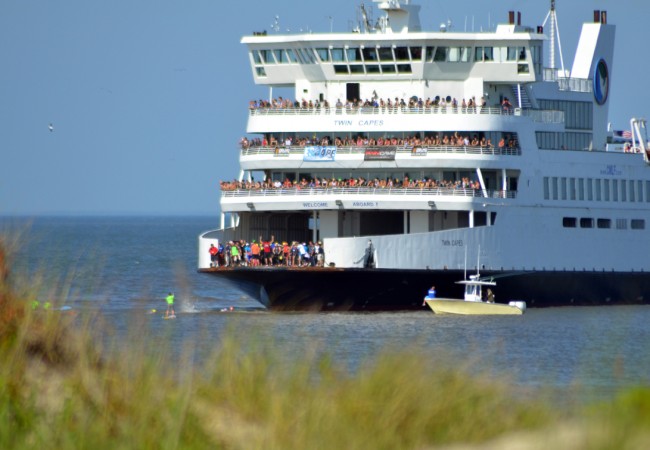 Jumping off the ferry to start the Triathalon!