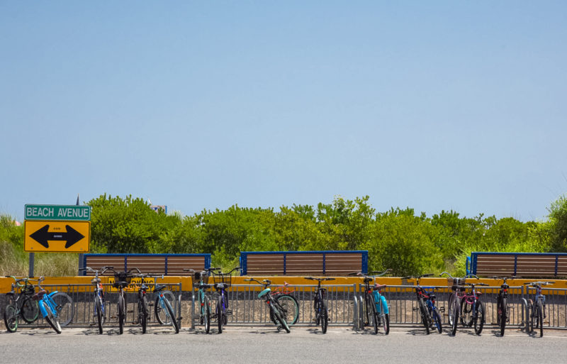 Bicycles lined up along Beach Avenue next to the promenade