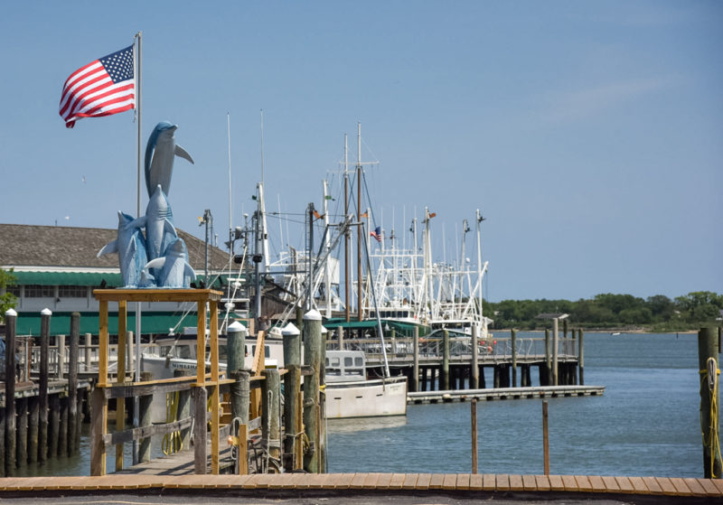 Cape May Harbor seen from the Lobster House with scalloping boats in the distance