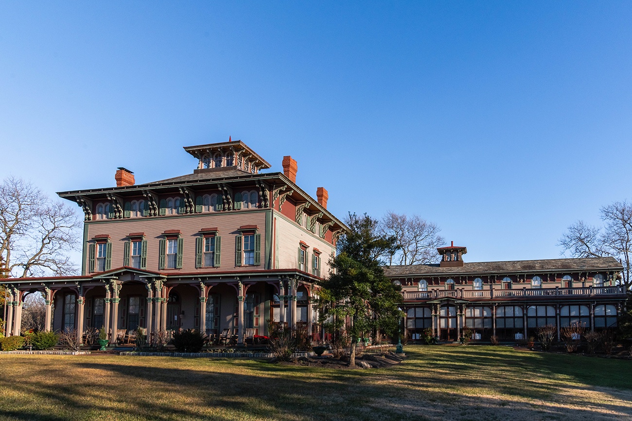 The Southern Mansion, a Victorian style bed and breakfast, on a clear sunny day with bright blue sky