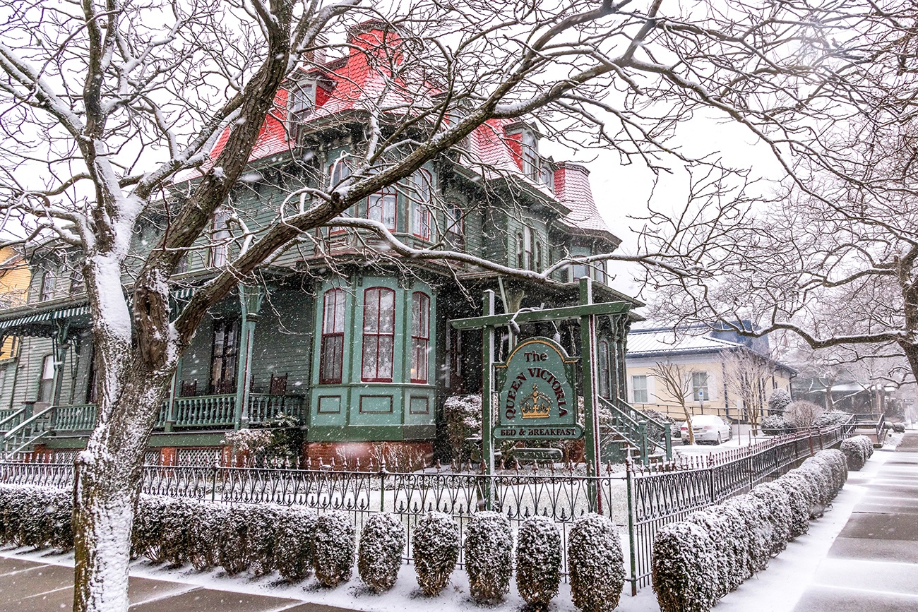 Snow falling on The Queen Victoria, a Victorian style bed and breakfast