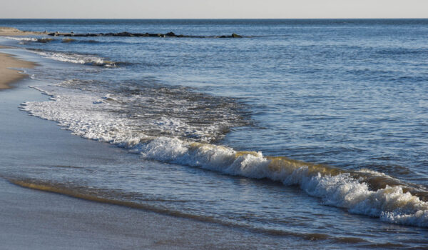 about to get my feet wet at the oceans edge.