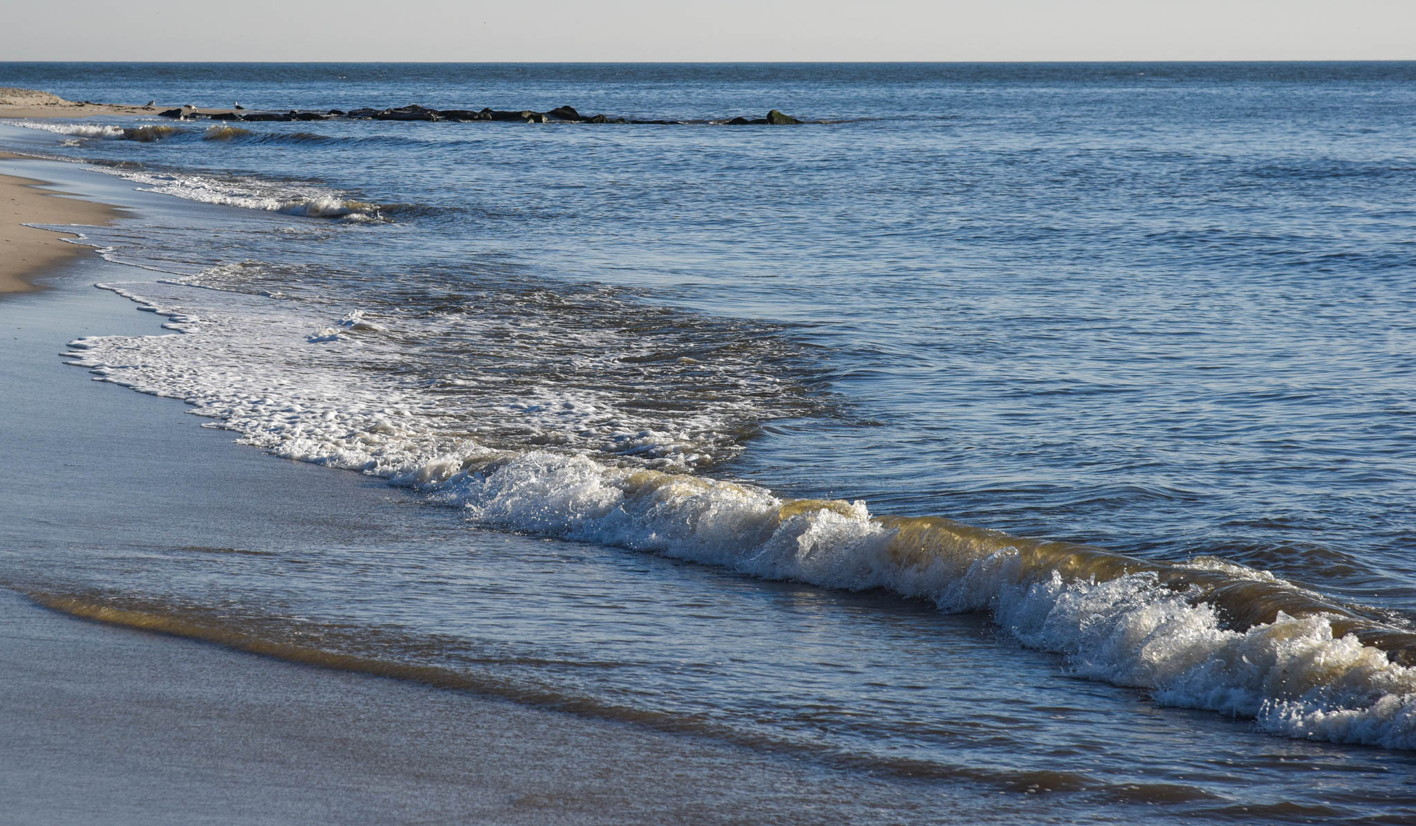 About to get my feet wet at the ocean's edge.