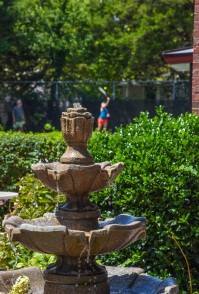 A fountain at The William J. Moore Tennis Center