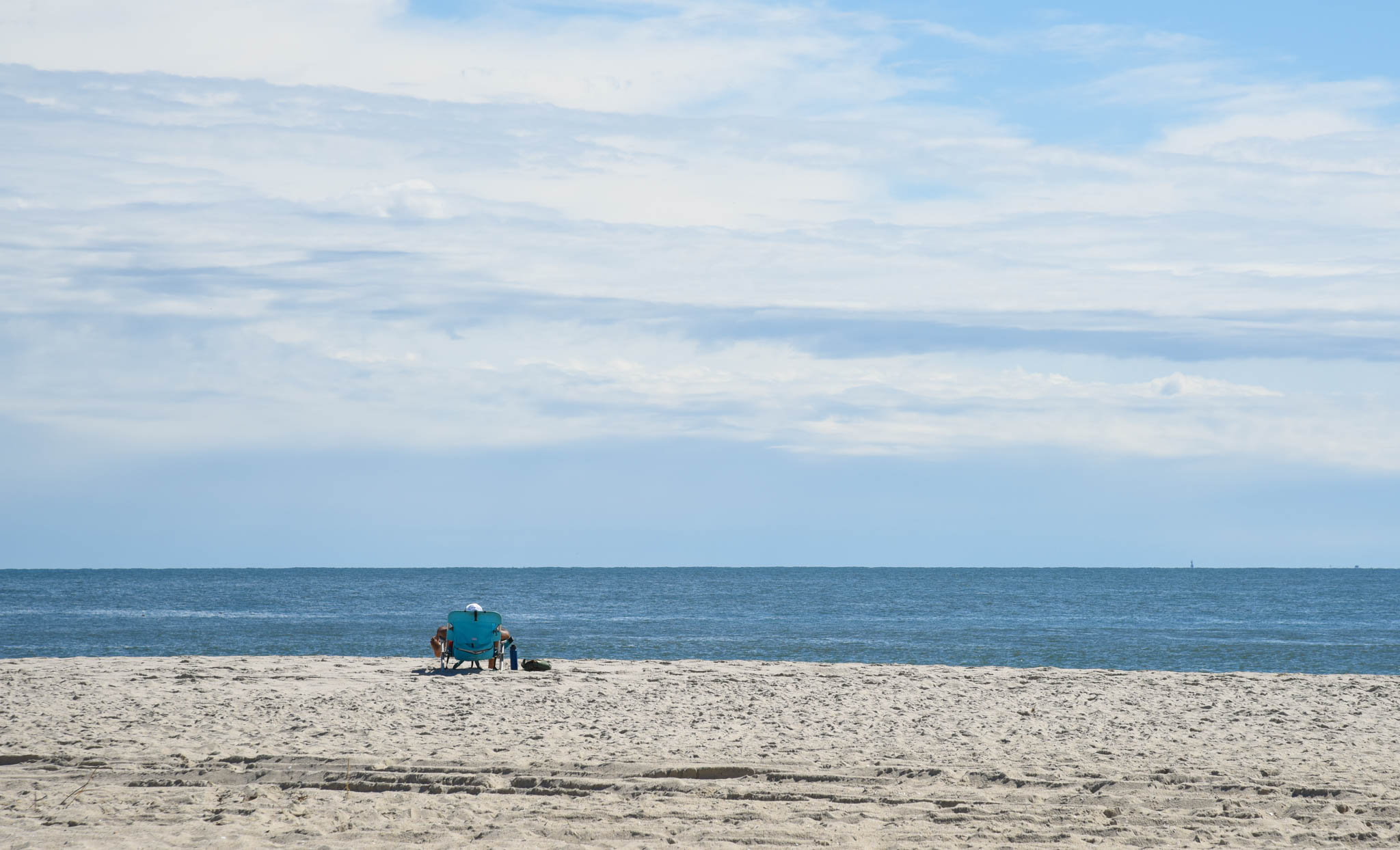 One person on the beach in a chair