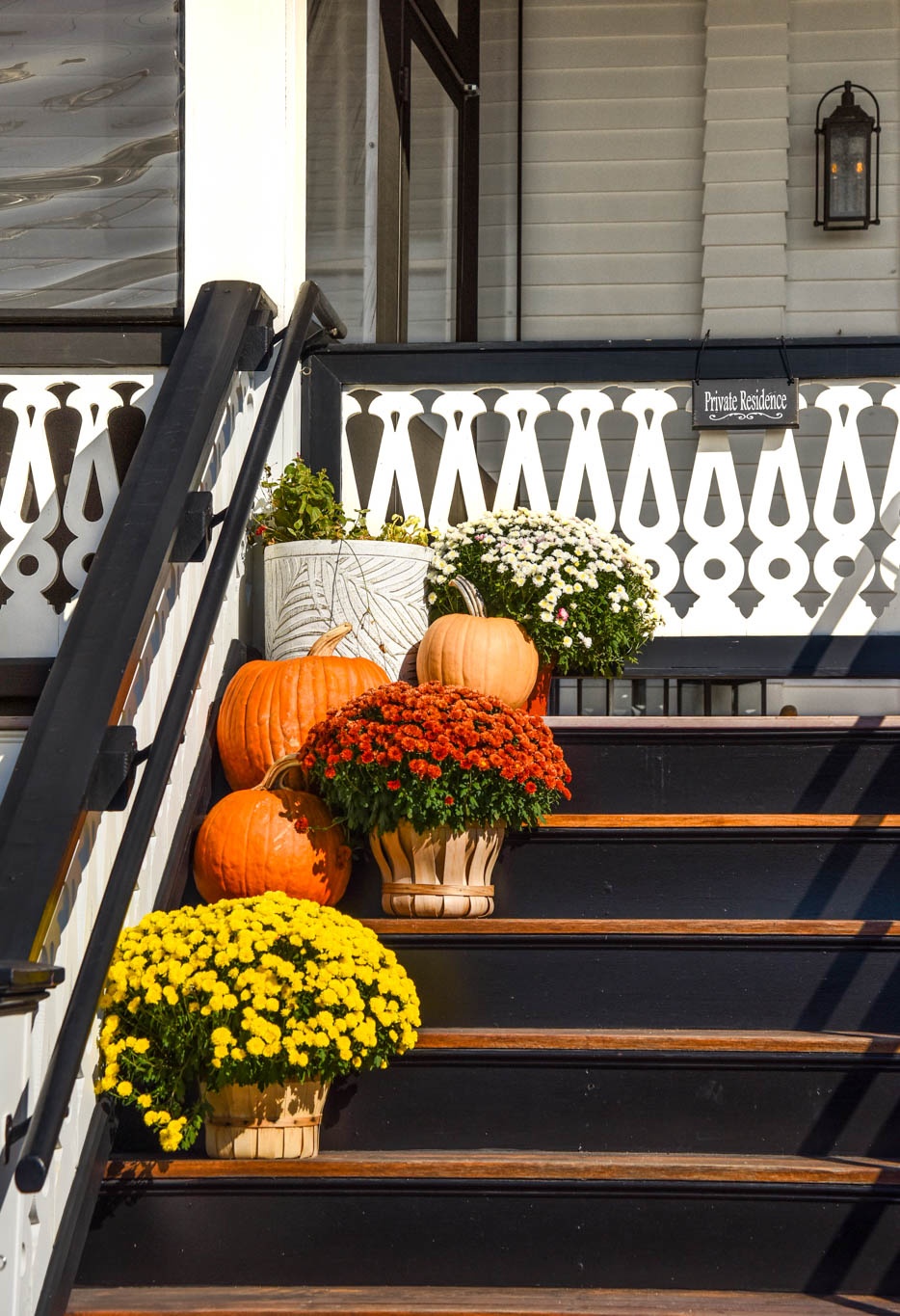Walking by a Private Residence with flowers and pumpkins on the steps