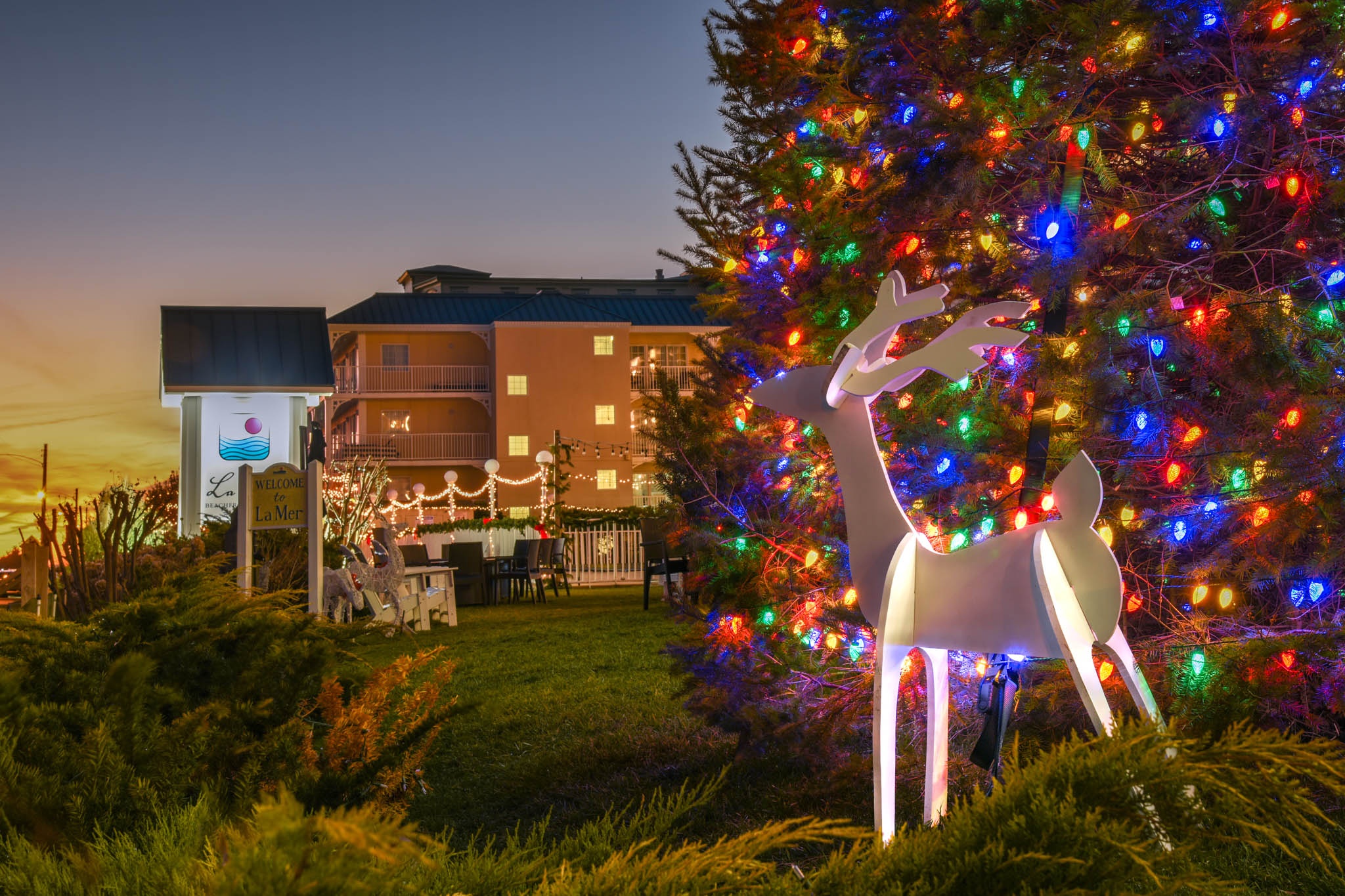 The La Mer  with Christmas lights at sunset