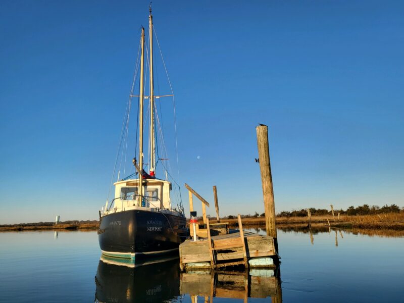 A boat docked in still water