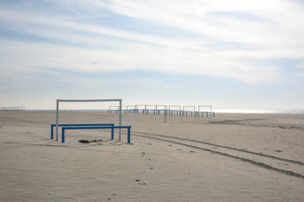 Follow the Lines along the beach passing the cabanas