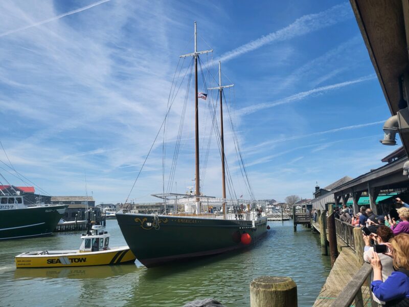 The Schooner American being pushed by SeaTow to its place alongside the Lobster House