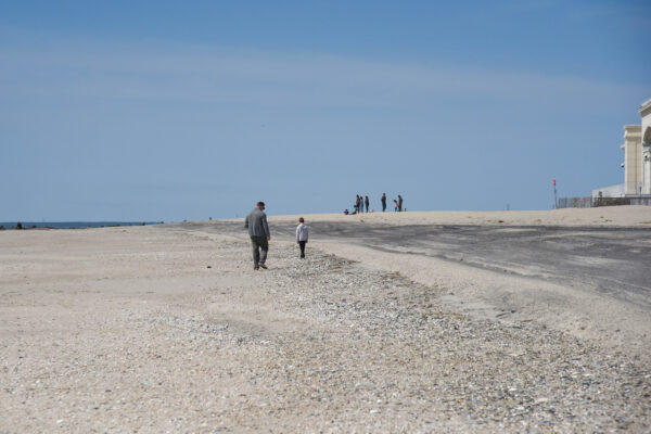 people Walking the Beach