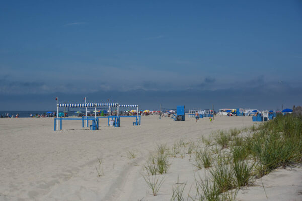 People enjoying the beach as Clouds Rolling In