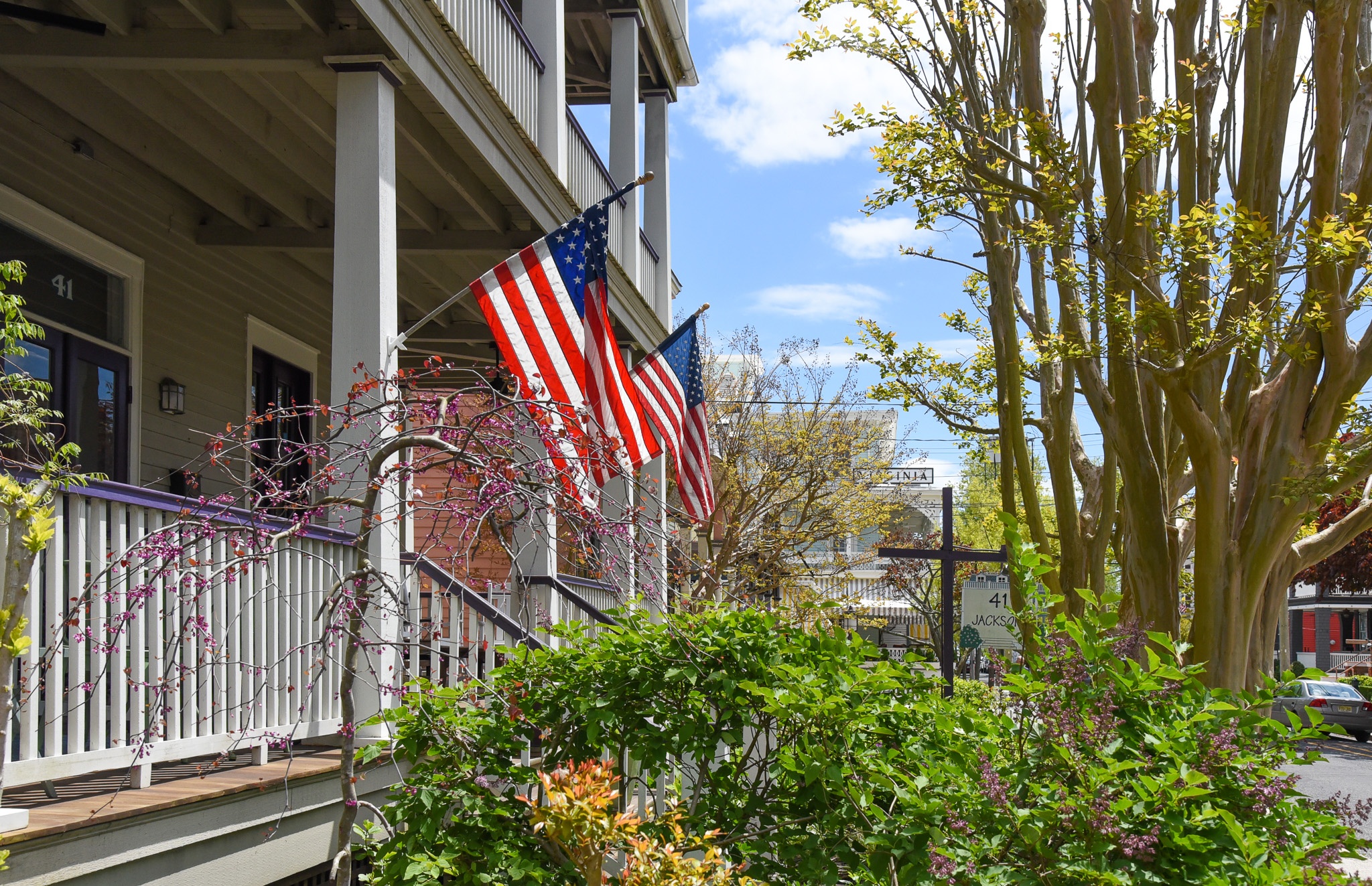 41 Jackson Street porch with flags hanging. 