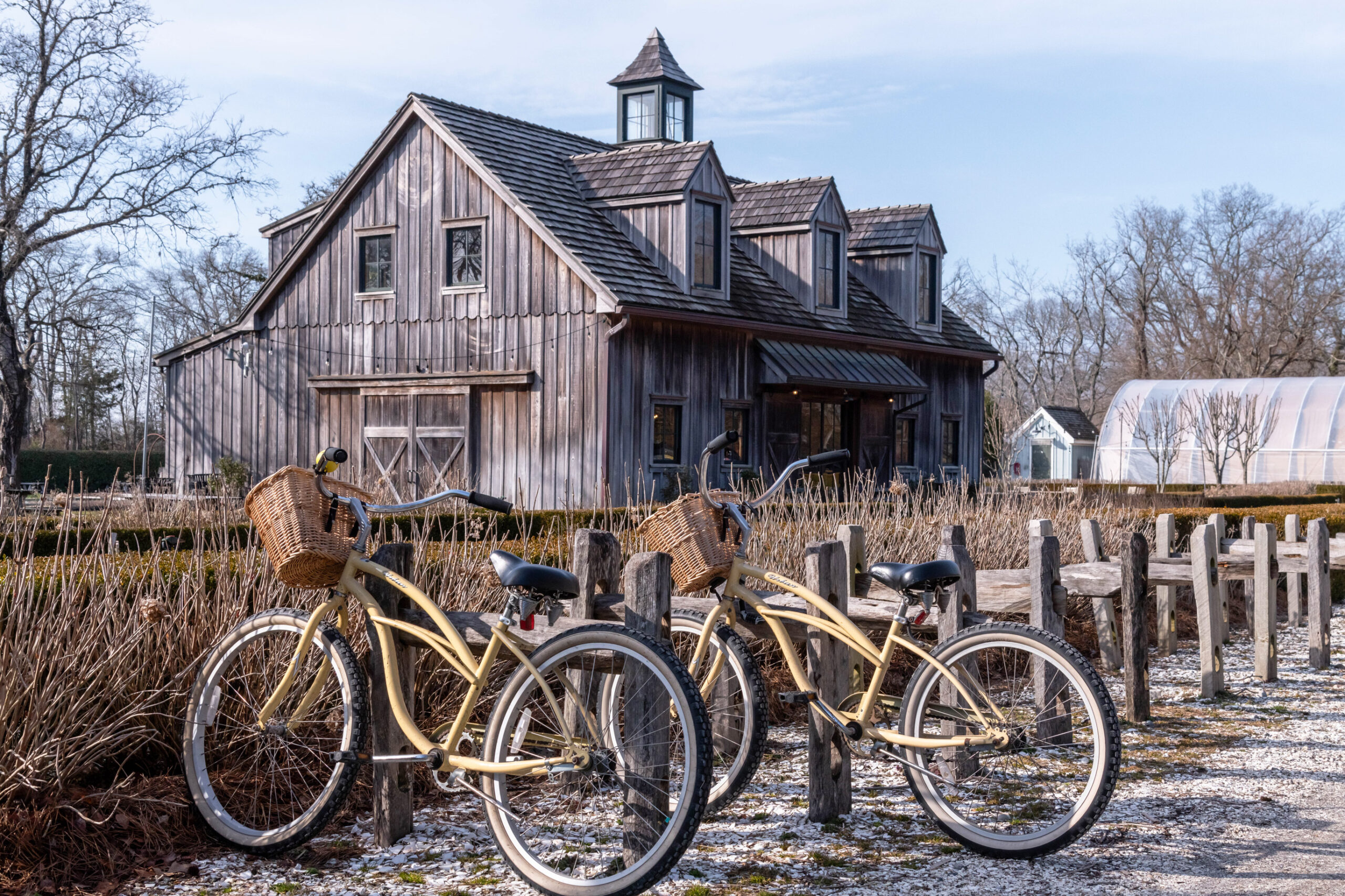 Two bikes in front of the Beach Plum Farm on a sunny day 