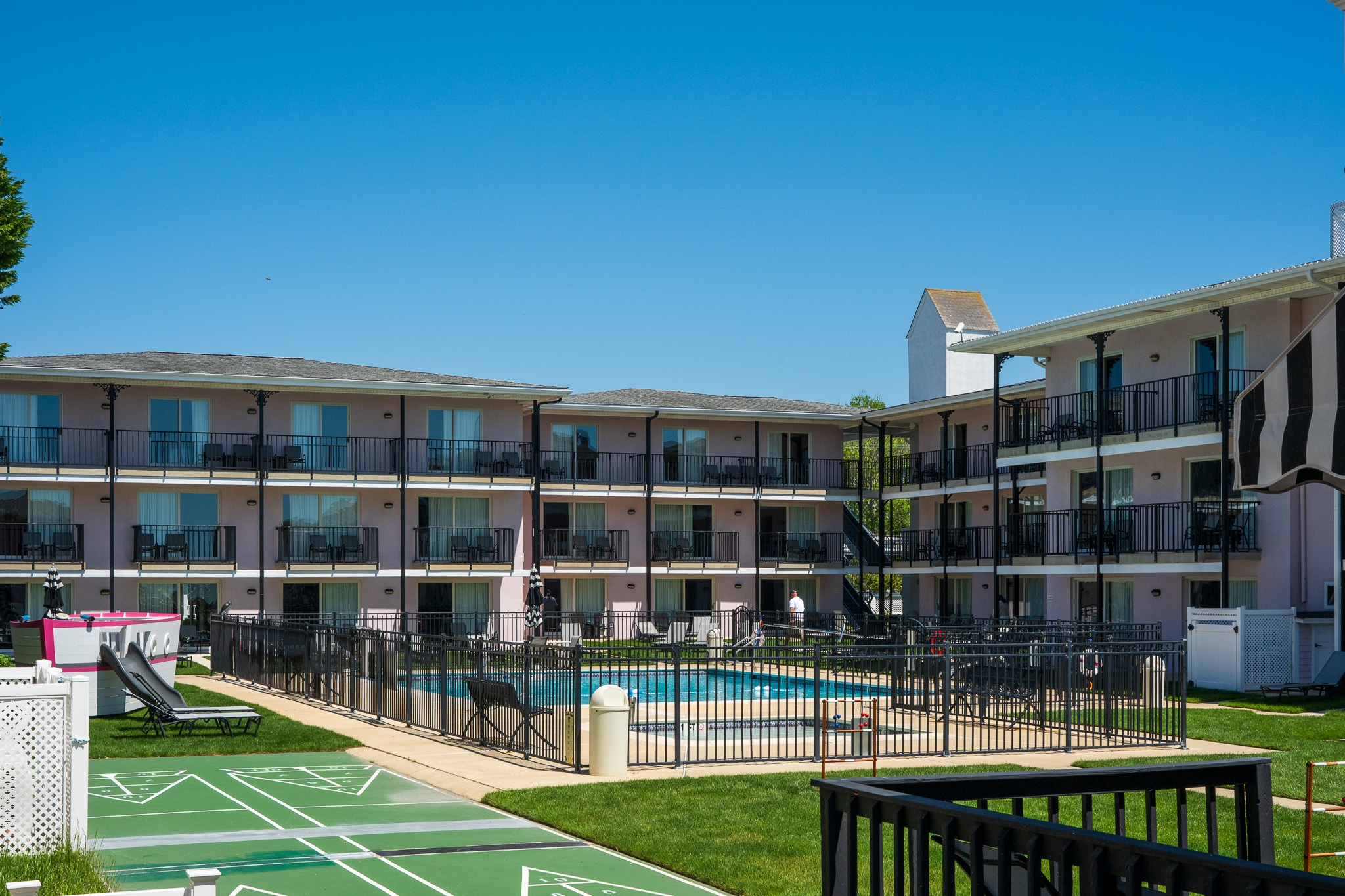 Pink, Green, & Blue you are looking at the Periwinkle Inn 