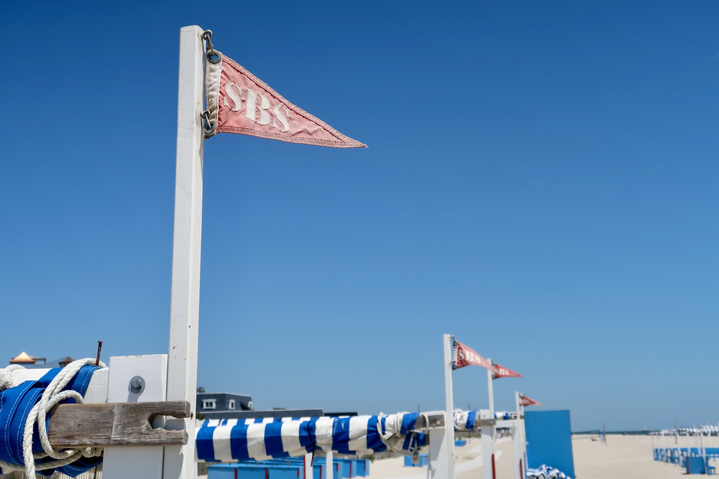 Stegers Beach Service flags on beach tents