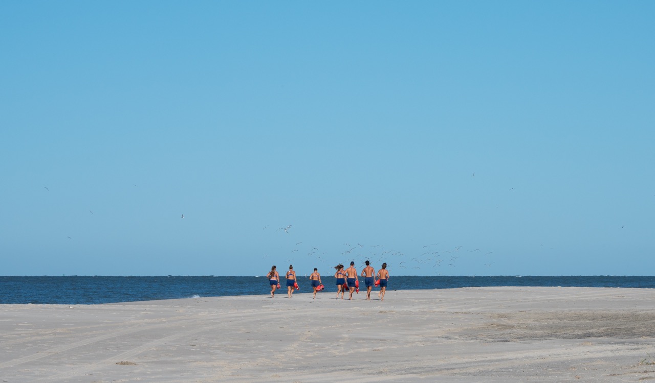 Cape May Point Lifeguards running before their morning shifts starts.