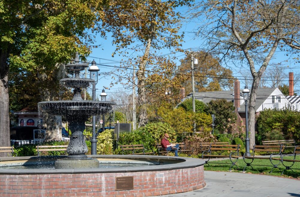 Writing in the Rotary Park next to the fountain.