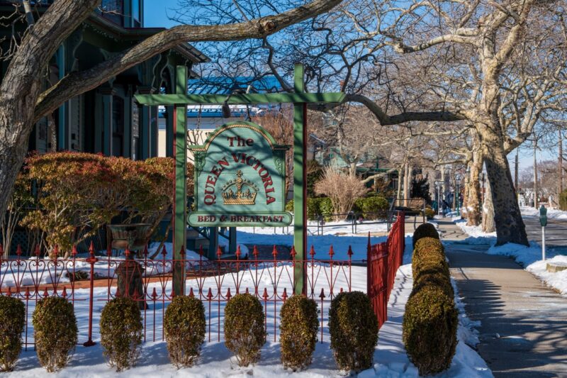 The Queen Victoria with snow on the lawn.