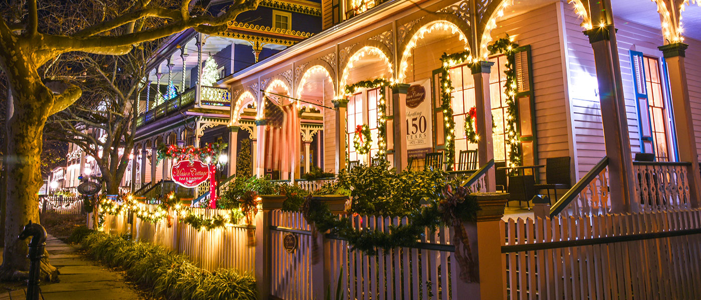 The Mason Cottage at night during the Christmas season